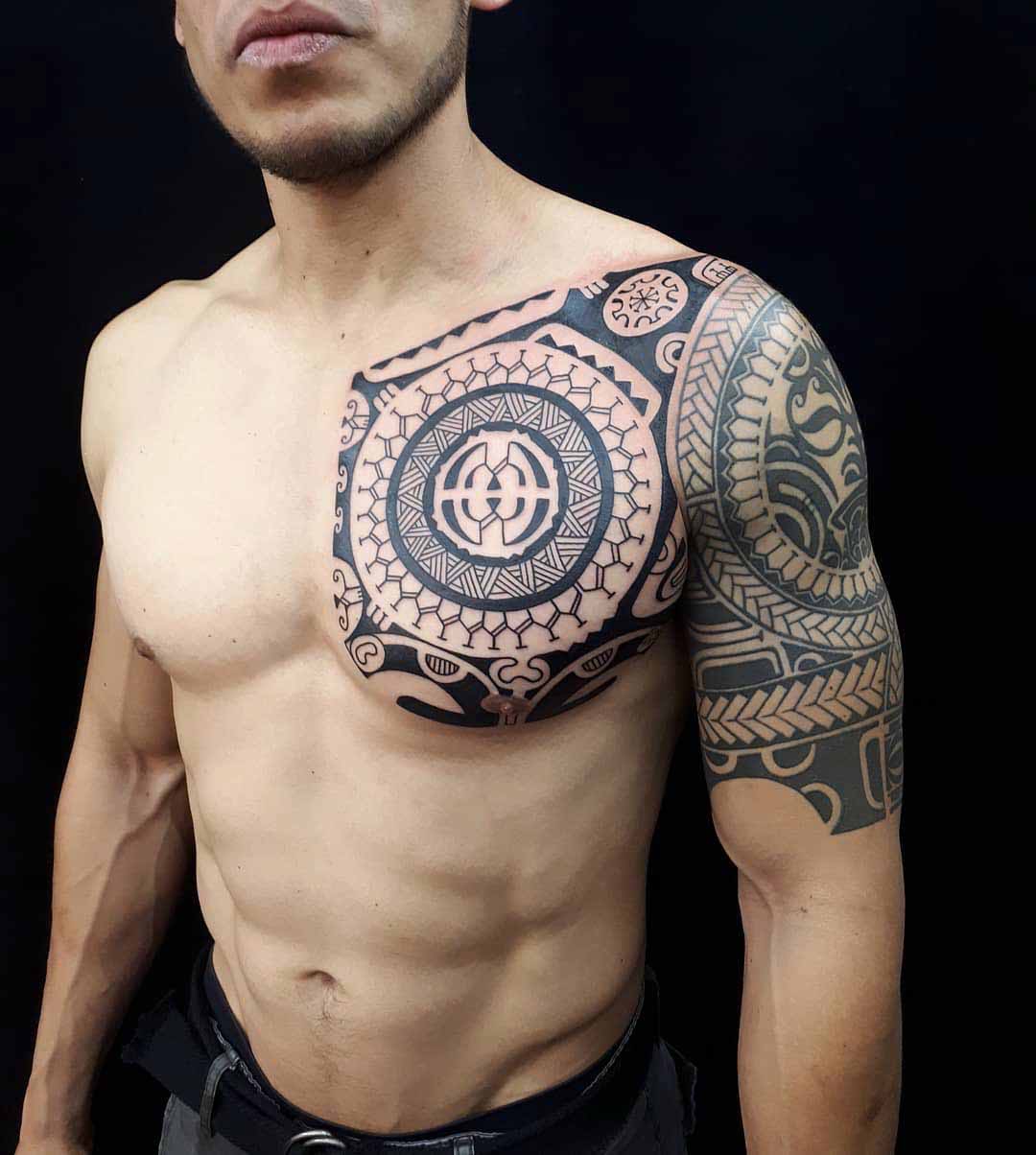 maori tattoo on chest and sleeve