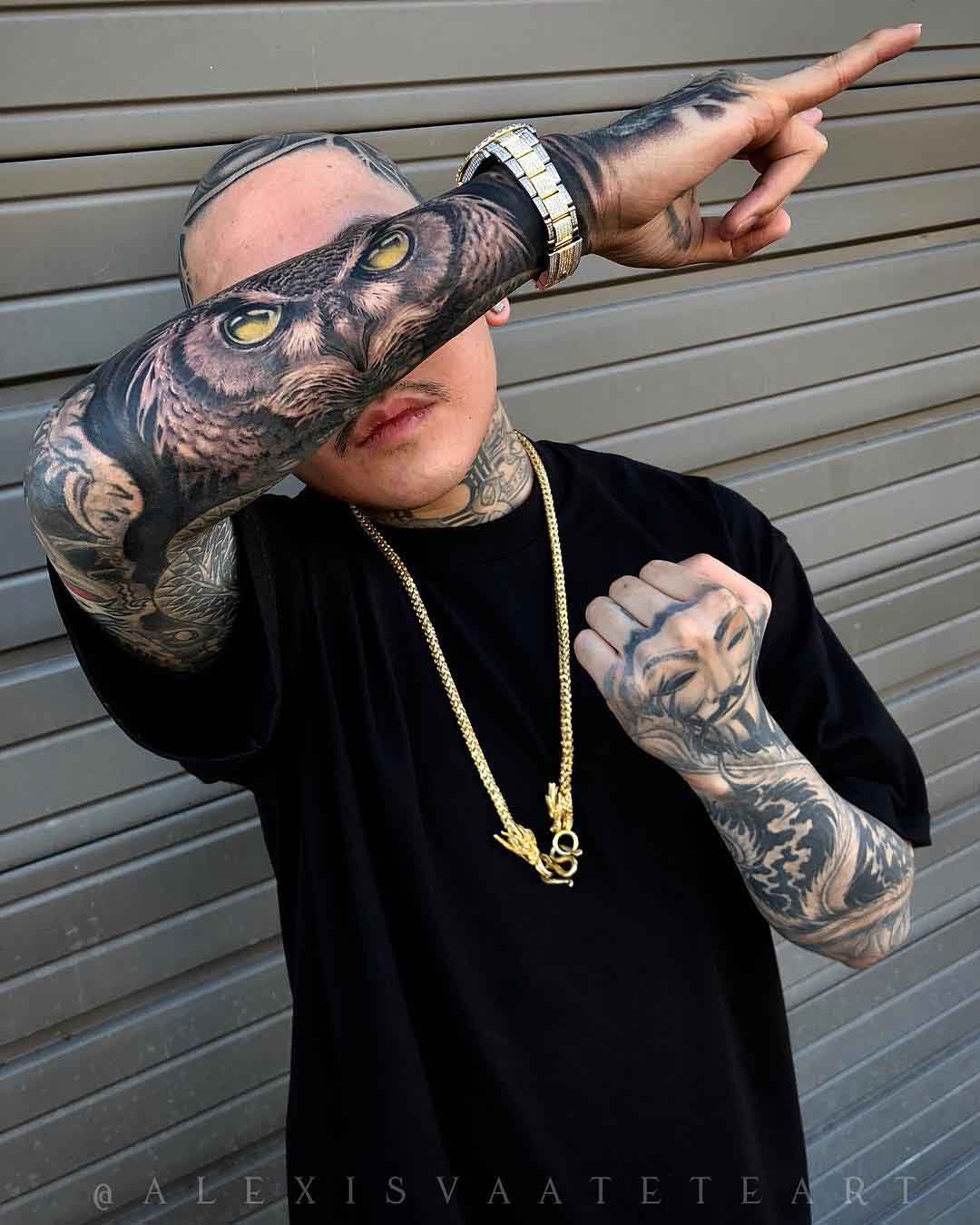 arm tattoo owl eyes