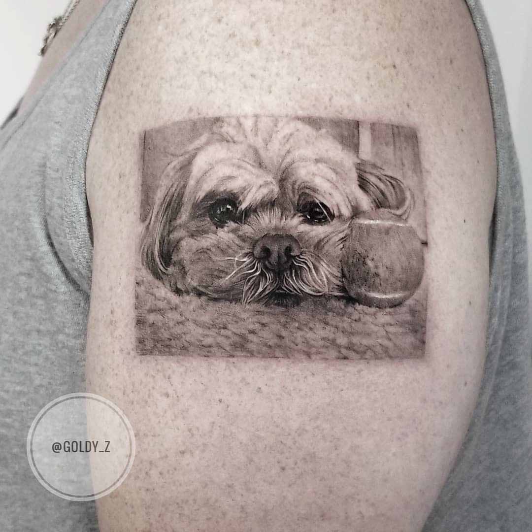 shoulder tattoo sad dog