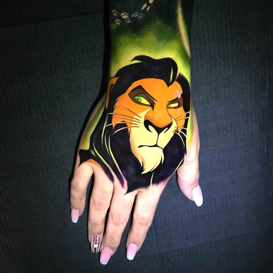 thi lion king scar tattoo on hand