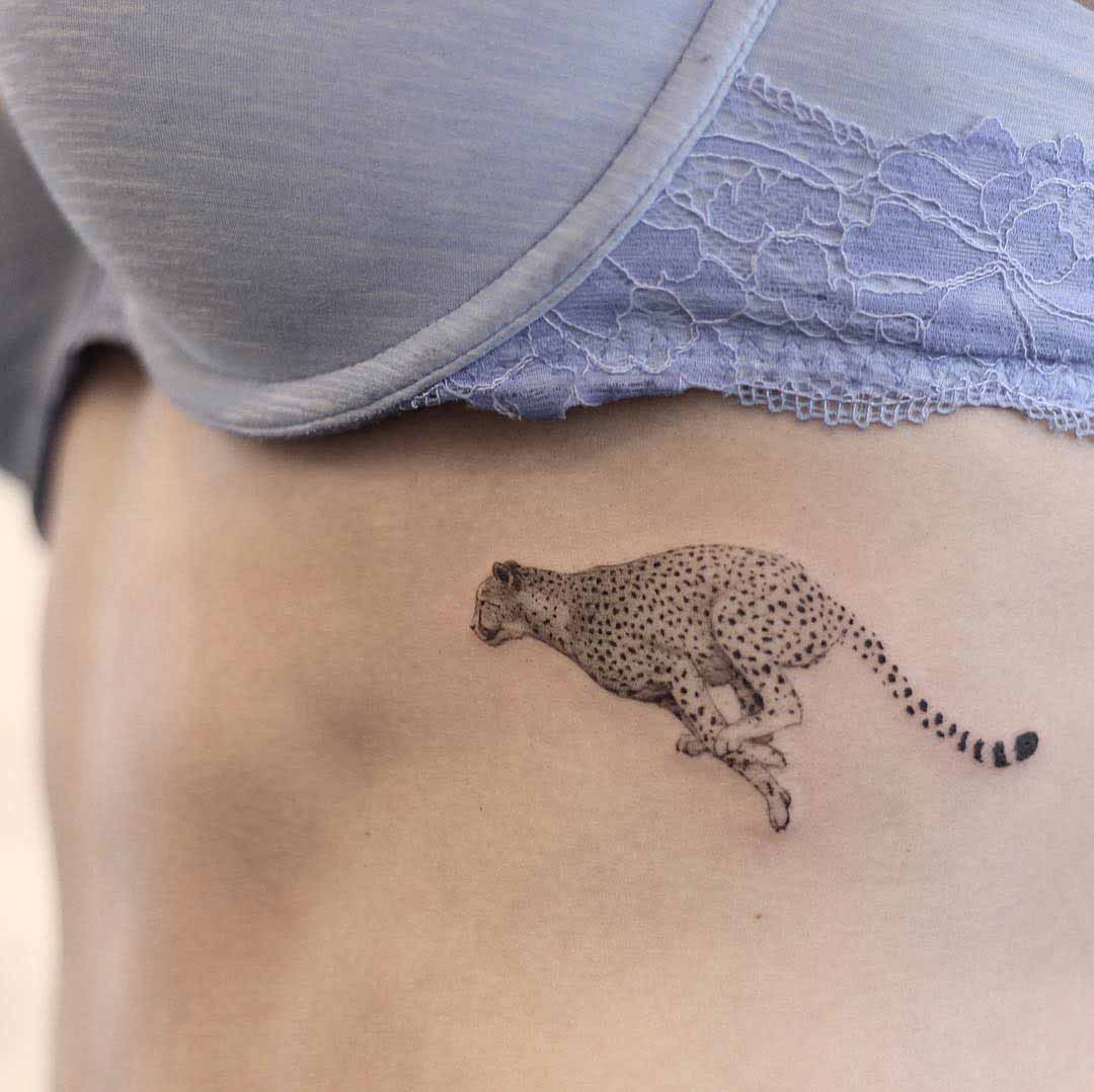 tiny cheetah tattoo