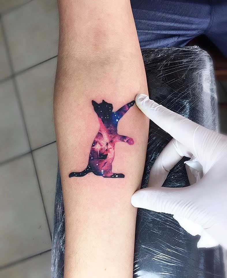 small cat tattoo universe