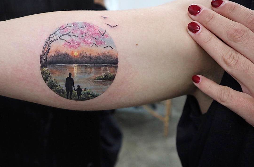 sunset landscape tattoo