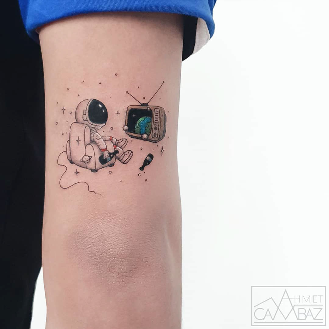 arm tattoo astronaut