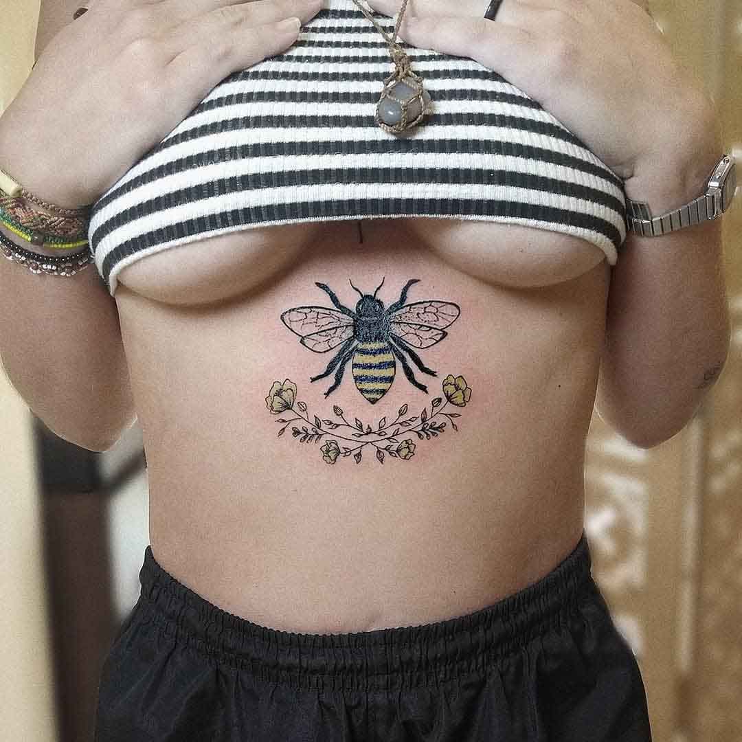 bee tattoo underboobs