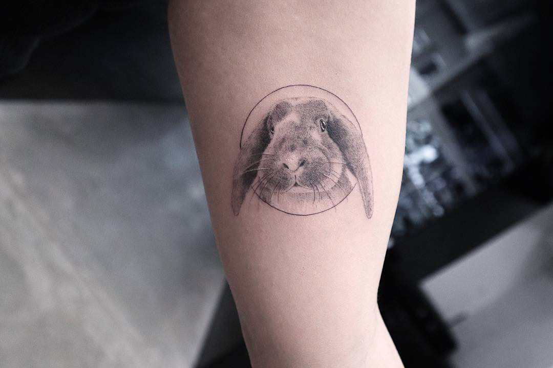 arm tattoo bunny